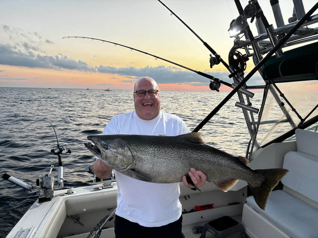 Man holding giant salmon