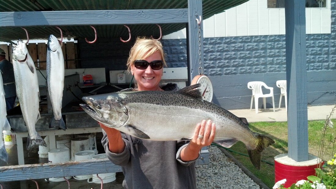 Woman holding Salmon